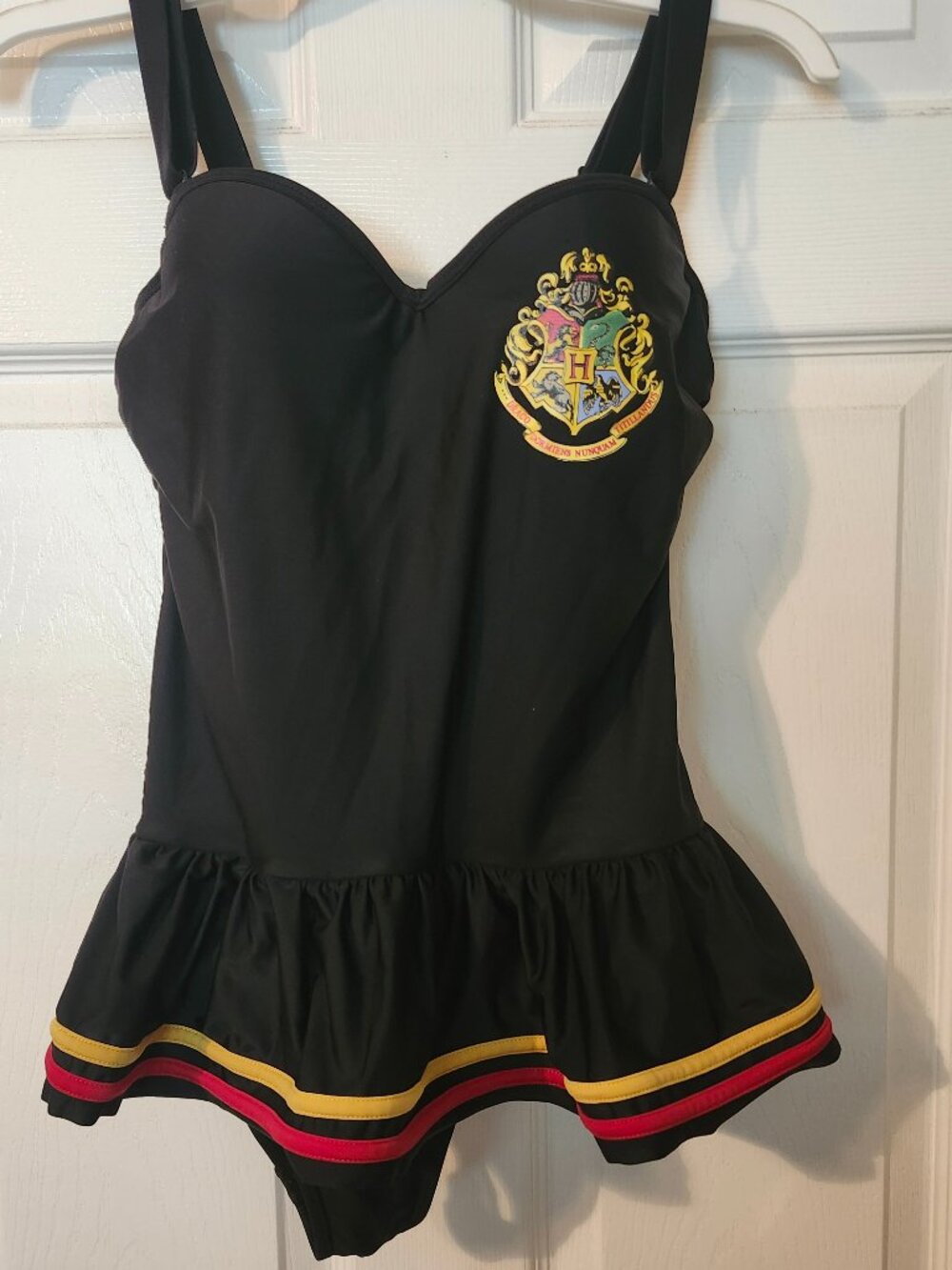 Black Women's One-Piece Swimdress with Crest Detail